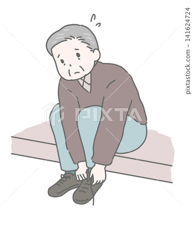 An elderly man struggling to put on his shoes. An elderly man struggling to put on his shoes. 141624724