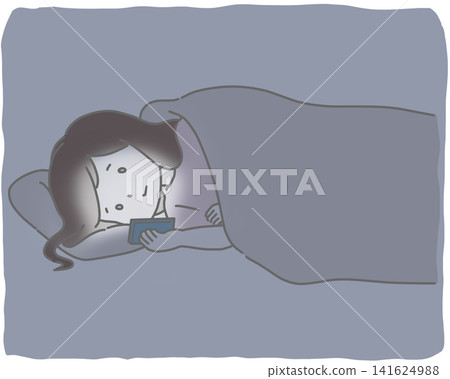A woman looking at her smartphone in bed in the middle of the night. A woman looking at her smartphone in bed in the middle of the night. 141624988