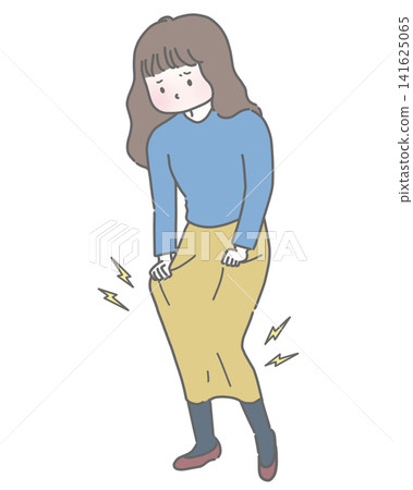 A woman's skirt clings to her body due to static electricity. A woman's skirt clings to her body due to static electricity. 141625065