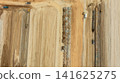Aerial view motor grader civil at construction site, Motor grader work on construction site, Road grader on road construction site machine work on the construction of new road. 141625275
