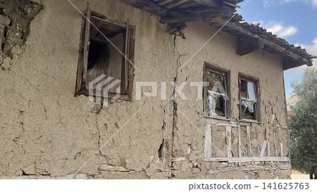 Century old village house in Harmankoy, Bilecik, nestled in green nature with rustic textures and timeless rural charm. Century old village house in Harmankoy, Bilecik, nestled in green nature with rustic textures and timeless rural charm. 141625763