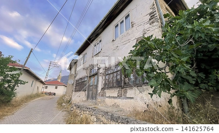 Century old village house in Harmankoy, Bilecik, nestled in green nature with rustic textures and timeless rural charm. Century old village house in Harmankoy, Bilecik, nestled in green nature with rustic textures and timeless rural charm. 141625764