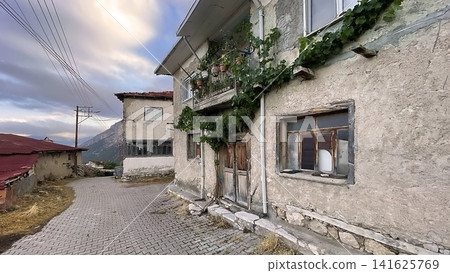 Century old village house in Harmankoy, Bilecik, nestled in green nature with rustic textures and timeless rural charm. Century old village house in Harmankoy, Bilecik, nestled in green nature with rustic textures and timeless rural charm. 141625769