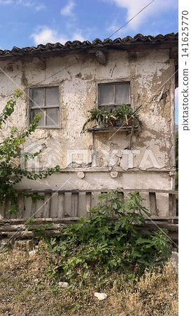 Century old village house in Harmankoy, Bilecik, nestled in green nature with rustic textures and timeless rural charm. Century old village house in Harmankoy, Bilecik, nestled in green nature with rustic textures and timeless rural charm. 141625770