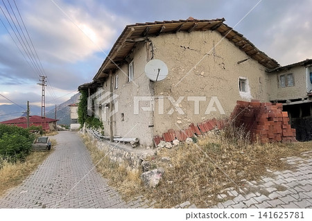 Century old village house in Harmankoy, Bilecik, nestled in green nature with rustic textures and timeless rural charm. Century old village house in Harmankoy, Bilecik, nestled in green nature with rustic textures and timeless rural charm. 141625781