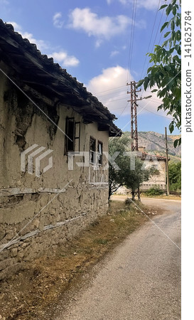 Century old village house in Harmankoy, Bilecik, nestled in green nature with rustic textures and timeless rural charm. Century old village house in Harmankoy, Bilecik, nestled in green nature with rustic textures and timeless rural charm. 141625784