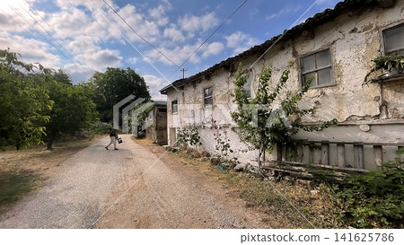 Century old village house in Harmankoy, Bilecik, nestled in green nature with rustic textures and timeless rural charm. Century old village house in Harmankoy, Bilecik, nestled in green nature with rustic textures and timeless rural charm. 141625786