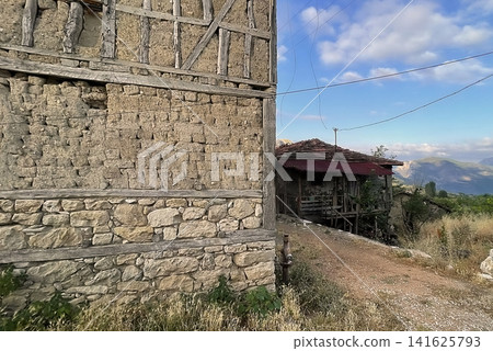 Century old village house in Harmankoy, Bilecik, nestled in green nature with rustic textures and timeless rural charm. Century old village house in Harmankoy, Bilecik, nestled in green nature with rustic textures and timeless rural charm. 141625793