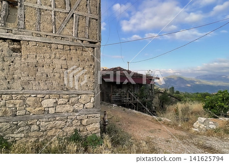 Century old village house in Harmankoy, Bilecik, nestled in green nature with rustic textures and timeless rural charm. Century old village house in Harmankoy, Bilecik, nestled in green nature with rustic textures and timeless rural charm. 141625794