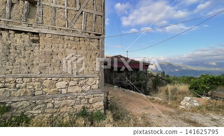 Century old village house in Harmankoy, Bilecik, nestled in green nature with rustic textures and timeless rural charm. Century old village house in Harmankoy, Bilecik, nestled in green nature with rustic textures and timeless rural charm. 141625795