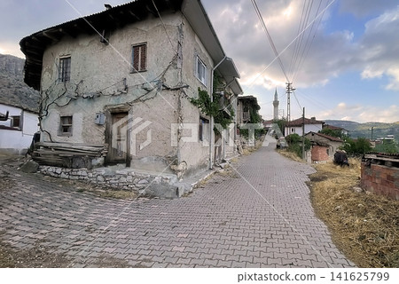 Century old village house in Harmankoy, Bilecik, nestled in green nature with rustic textures and timeless rural charm. Century old village house in Harmankoy, Bilecik, nestled in green nature with rustic textures and timeless rural charm. 141625799