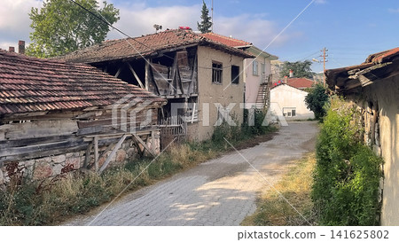 Century old village house in Harmankoy, Bilecik, nestled in green nature with rustic textures and timeless rural charm. Century old village house in Harmankoy, Bilecik, nestled in green nature with rustic textures and timeless rural charm. 141625802