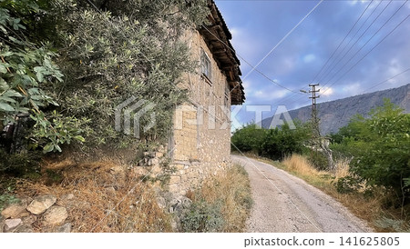 Century old village house in Harmankoy, Bilecik, nestled in green nature with rustic textures and timeless rural charm. Century old village house in Harmankoy, Bilecik, nestled in green nature with rustic textures and timeless rural charm. 141625805