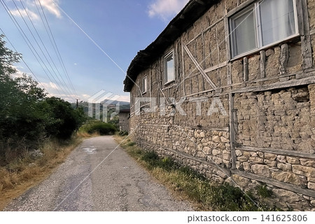Century old village house in Harmankoy, Bilecik, nestled in green nature with rustic textures and timeless rural charm. Century old village house in Harmankoy, Bilecik, nestled in green nature with rustic textures and timeless rural charm. 141625806