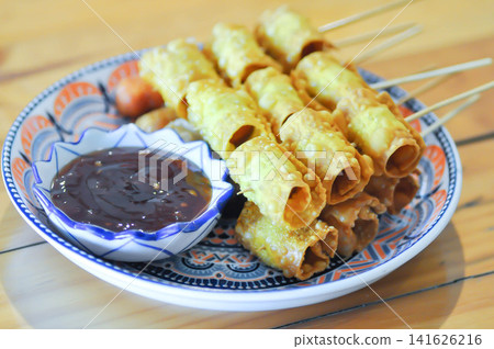 fried wonton, deep fried wonton or fried dumpling or deep fried dumpling and dip fried wonton, deep fried wonton or fried dumpling or deep fried dumpling and dip 141626216