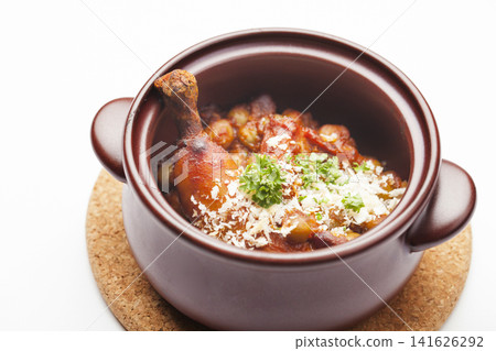 Cassoulet cooked in an earthenware pot with white beans Cassoulet cooked in an earthenware pot with white beans 141626292