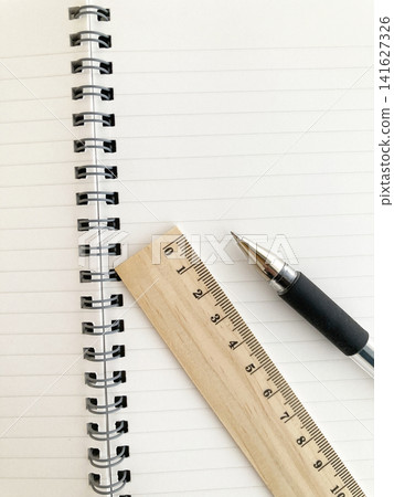 Notebook with wooden ruler and pen - for learning, business, messages, and record-keeping. Notebook with wooden ruler and pen - for learning, business, messages, and record-keeping. 141627326