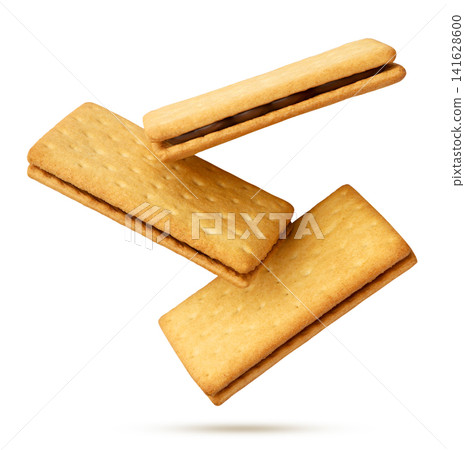 Sandwich cookies flying close-up on a white background. Isolated Sandwich cookies flying close-up on a white background. Isolated 141628600