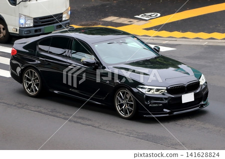 German-made black sedan German-made black sedan 141628824