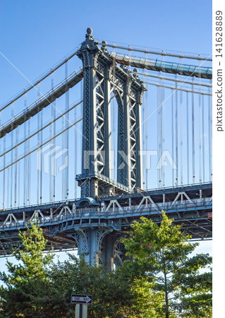 View of the Manhattan Bridge in New York City. View of the Manhattan Bridge in New York City. 141628889