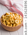 Italian Taralli Snack Rings In Ceramic Bowl With Olive Oil And Pink Checkered Cloth 141628896