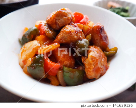 A close-up of sizzling sweet and sour pork A close-up of sizzling sweet and sour pork 141629126