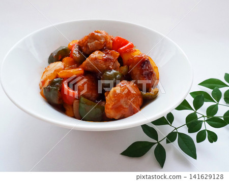 Homemade sweet and sour pork on a white background Homemade sweet and sour pork on a white background 141629128