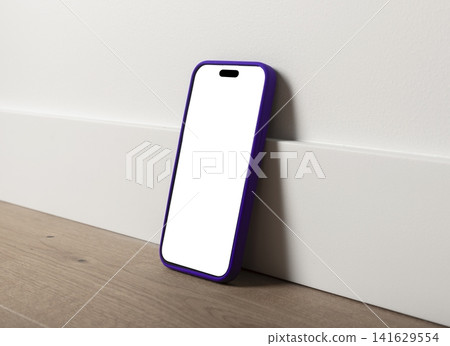 Blank smartphone mockup in purple case on a wooden floor. Angled mobile phone with white screen against a wall. Copy space for app design, advertising, and branding.. Blank smartphone mockup in purple case on a wooden floor. Angled mobile phone with white screen against a wall. Copy space for app design, advertising, and branding.. 141629554
