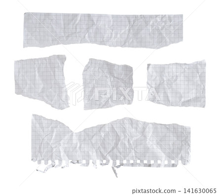 Crumpled torn white graph paper scraps and ripped grid pieces set isolated on white background Crumpled torn white graph paper scraps and ripped grid pieces set isolated on white background 141630065