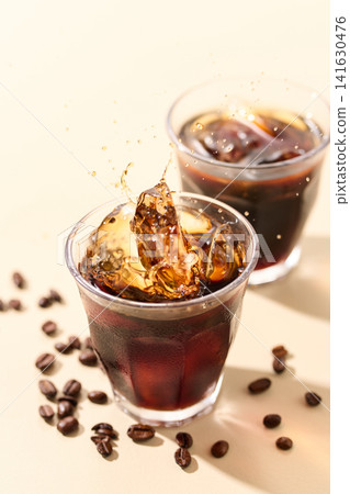 iced coffee poured into a glass 141630476