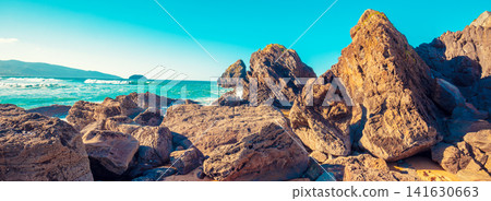 Beautiful rocky seascape on a sunny day Beautiful rocky seascape on a sunny day 141630663