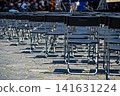 Empty chairs set up for an event in Prague, waiting for the audience at a public gathering 141631224