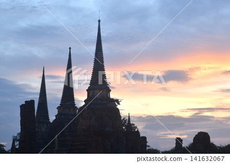 pagoda of Wat Phra Si Sanphet or temple of the holy, splendid Omniscient in twilight sunset sky background on evening pagoda of Wat Phra Si Sanphet or temple of the holy, splendid Omniscient in twilight sunset sky background on evening 141632067