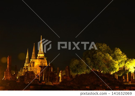 pagoda of Wat Phra Si Sanphet or temple of the holy, splendid Omniscient with electric lamp in night pagoda of Wat Phra Si Sanphet or temple of the holy, splendid Omniscient with electric lamp in night 141632069