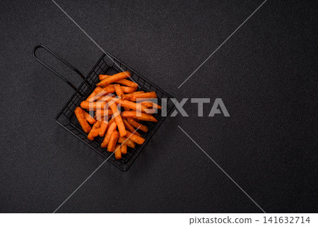 Seasoned sweet potato fries with sauce, fast food. Sweet potato fries Seasoned sweet potato fries with sauce, fast food. Sweet potato fries 141632714