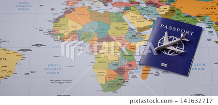 International passport against a map backdrop, concepts of travel. Passport on a map International passport against a map backdrop, concepts of travel. Passport on a map 141632717