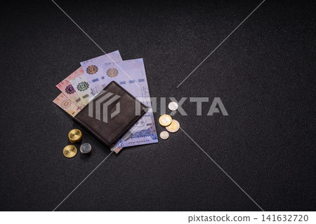 Saudi Arabia paper money, riyal banknotes and coins as currency for exchange. Saudi Arabia money 141632720