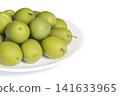 Pickled green olives on the white porcelain plate 141633965