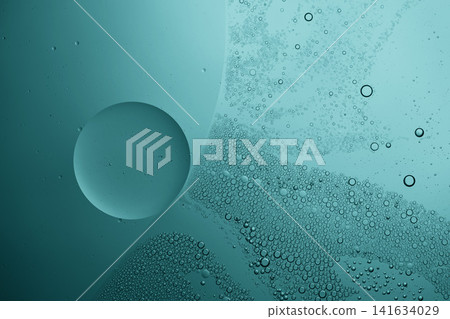 Abstract background of oil droplets and bubbles suspended in teal liquid Abstract background of oil droplets and bubbles suspended in teal liquid 141634029