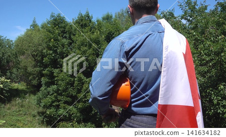 Construction worker and Canadian flag Construction worker and Canadian flag 141634182