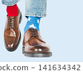 Men's legs, red and blue socks 141634342
