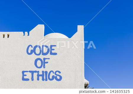 Code of ethics words symbol. Concept words Code of ethics on beautiful white wall. Beautiful blue sky background. Business Code of ethics concept. Copy space. Code of ethics words symbol. Concept words Code of ethics on beautiful white wall. Beautiful blue sky background. Business Code of ethics concept. Copy space. 141635325