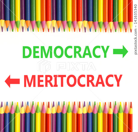 Democracy or meritocracy words symbol. Concept words Democracy Meritocracy on beautiful white paper. Beautiful white background. Colored pencils. Business democracy meritocracy concept. Copy space Democracy or meritocracy words symbol. Concept words Democracy Meritocracy on beautiful white paper. Beautiful white background. Colored pencils. Business democracy meritocracy concept. Copy space 141635340
