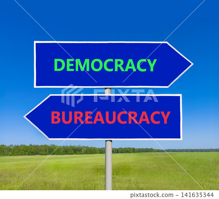 Democracy or bureaucracy words symbol. Concept words Democracy Bureaucracy on beautiful blue road sign. Beautiful blue sky background. Business democracy bureaucracy concept. Copy space 141635344