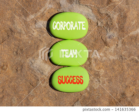 Corporate team success words symbol. Concept words Corporate team success on beautiful green stones. Beautiful stone background. Business corporate team success concept. Copy space. Corporate team success words symbol. Concept words Corporate team success on beautiful green stones. Beautiful stone background. Business corporate team success concept. Copy space. 141635366