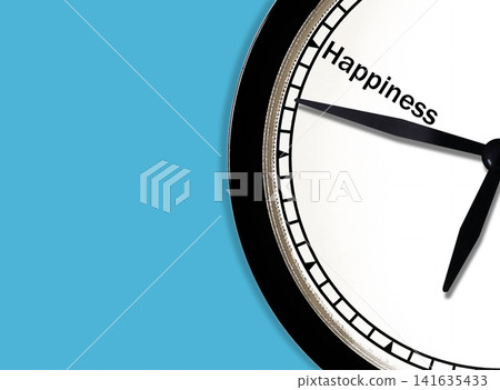 Clock pointer on happiness text with blue copy space background Clock pointer on happiness text with blue copy space background 141635433