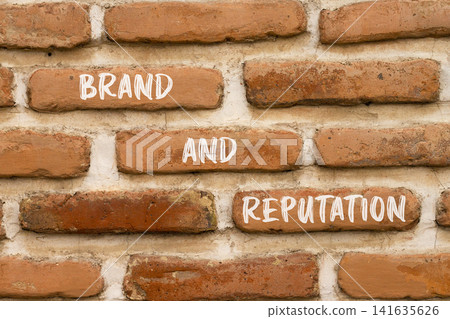 Brand and reputation words symbol. Concept words Brand and reputation on beautiful brick wall. Beautiful brick wall background. Business brand and reputation concept. Copy space. Brand and reputation words symbol. Concept words Brand and reputation on beautiful brick wall. Beautiful brick wall background. Business brand and reputation concept. Copy space. 141635626
