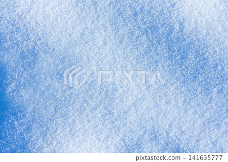 Abstract bright snowy background with copy space. Winter garden landscape with snowdrifts. Abstract bright snowy background with copy space. Winter garden landscape with snowdrifts. 141635777
