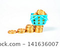 Rising stacks of gold coins form a growth chart with a blue shopping basket full of money on top. Concept of retail success, wealth accumulation, and investment growth on a white background. 141636007
