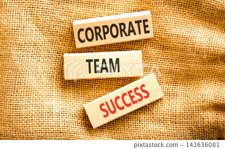 Corporate team success words symbol. Concept words Corporate team success on beautiful wooden blocks. Beautiful canvas background. Business corporate team success concept. Copy space. Corporate team success words symbol. Concept words Corporate team success on beautiful wooden blocks. Beautiful canvas background. Business corporate team success concept. Copy space. 141636081